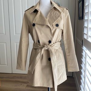 Brand new with tag trench coat in light tan